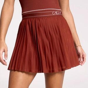 CALIA | Women's Pleated Mesh Skort red brown
